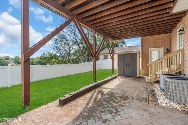 a view of backyard with green space