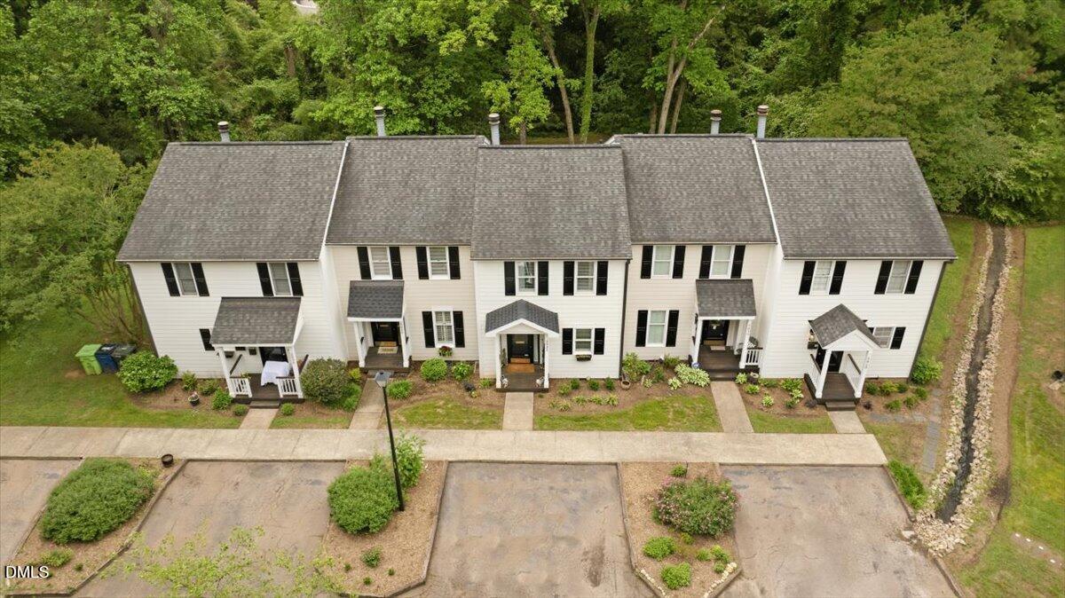 2834 Wayland Drive Raleigh, NC 27608 - Photo 25 of 26 an aerial view of residential houses with yard and green space