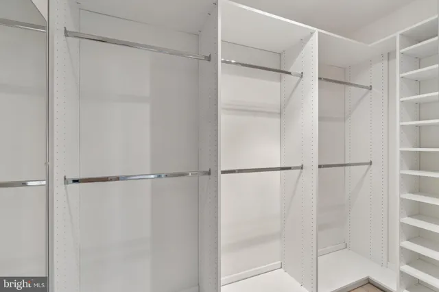 a view of an empty walk in closet
