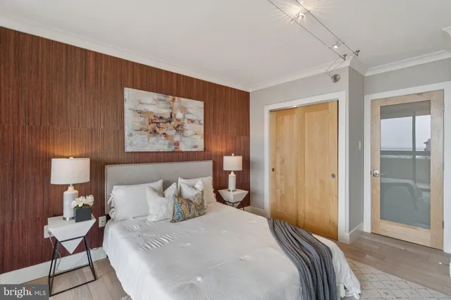 a bedroom with bed and window