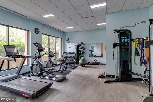 a view of a balcony with chair and dryer