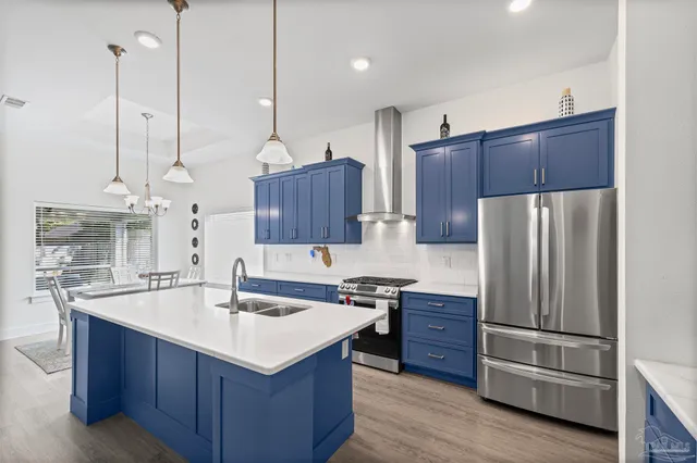 a large room with a large window and flat screen tv