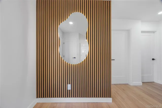 a kitchen with white cabinets stainless steel appliances and sink