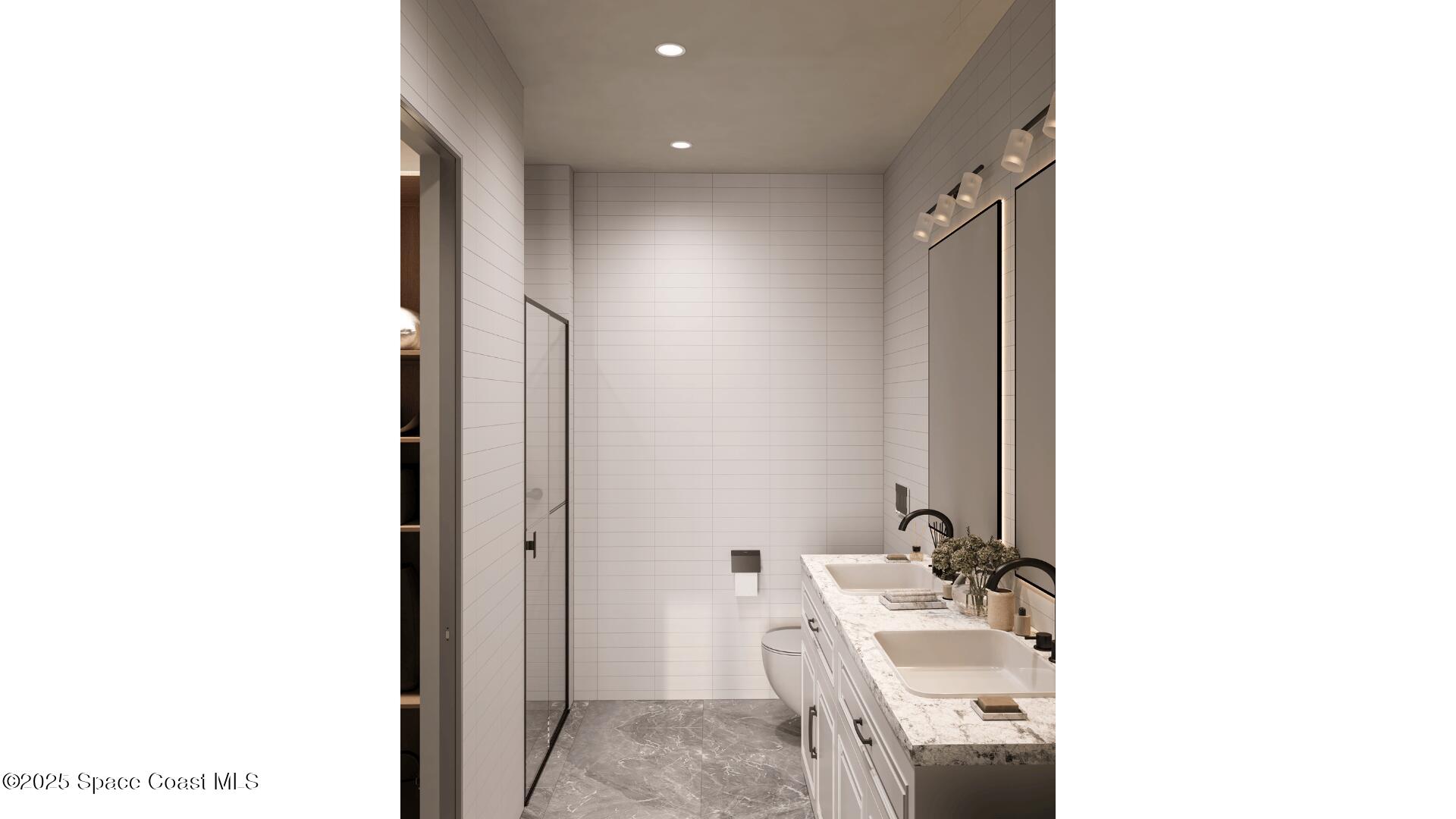 1230 Jimmy Buffett Mem Highway, Unit 410 Satellite Beach, FL 32937 - Photo 9 of 14 a bathroom with a sink and a mirror