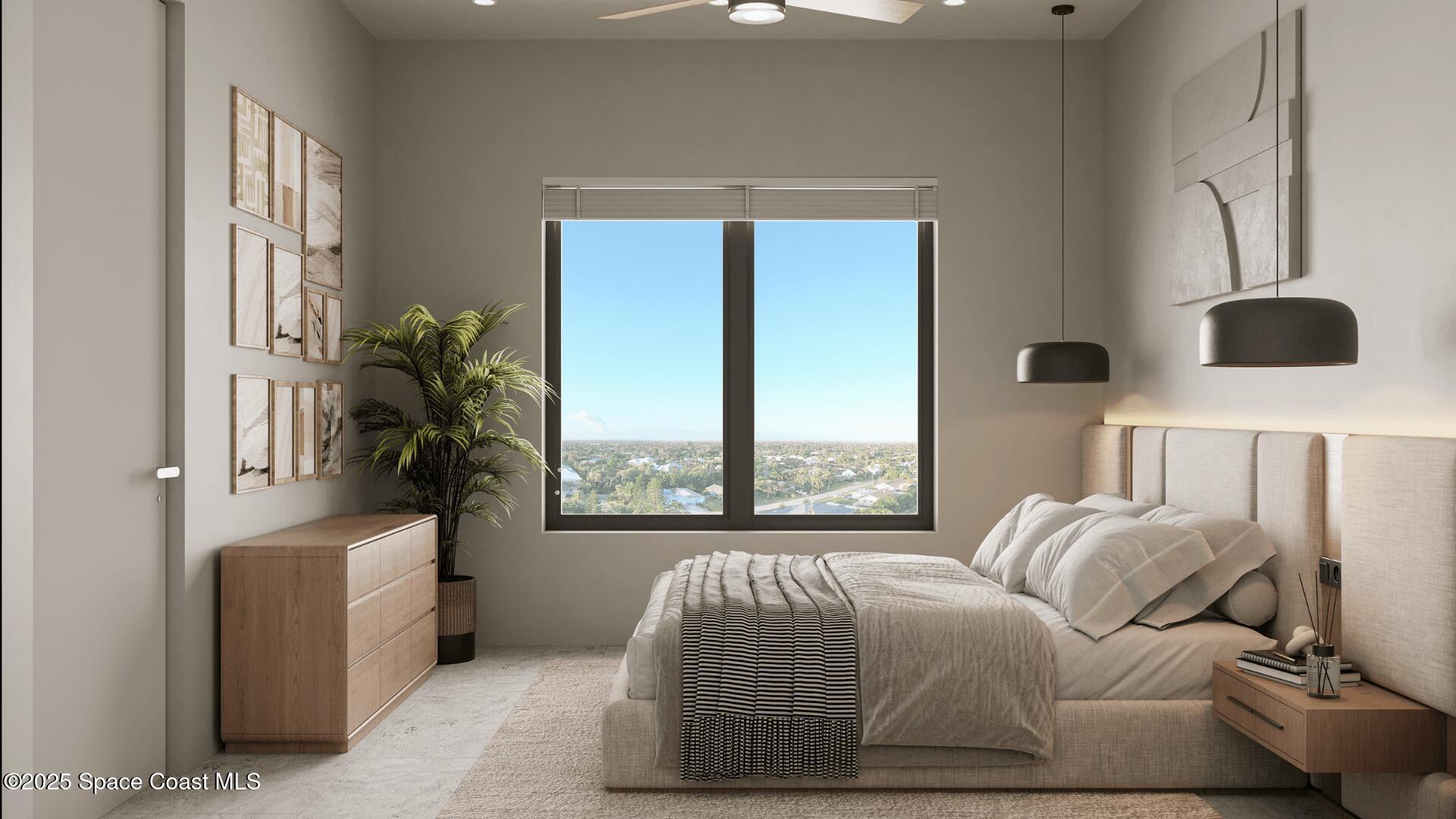 1230 Jimmy Buffett Mem Highway, Unit 410 Satellite Beach, FL 32937 - Photo 10 of 14 a bedroom with a bed and a large window