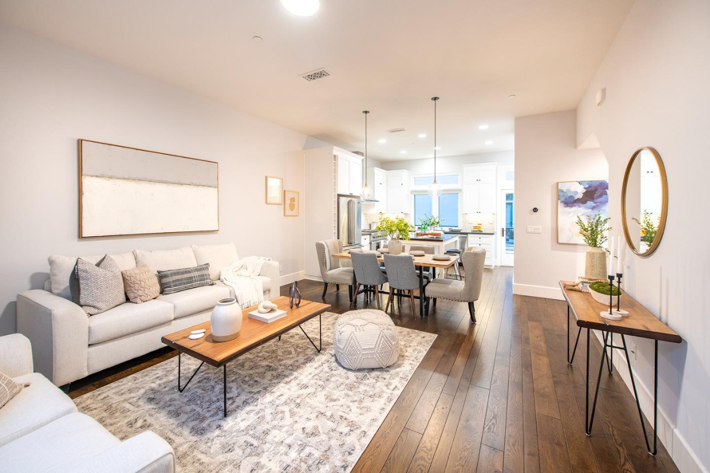 534 Fierro Loop Campbell, CA 95008 - Photo 11 of 55 a living room with lots of furniture a rug and kitchen view