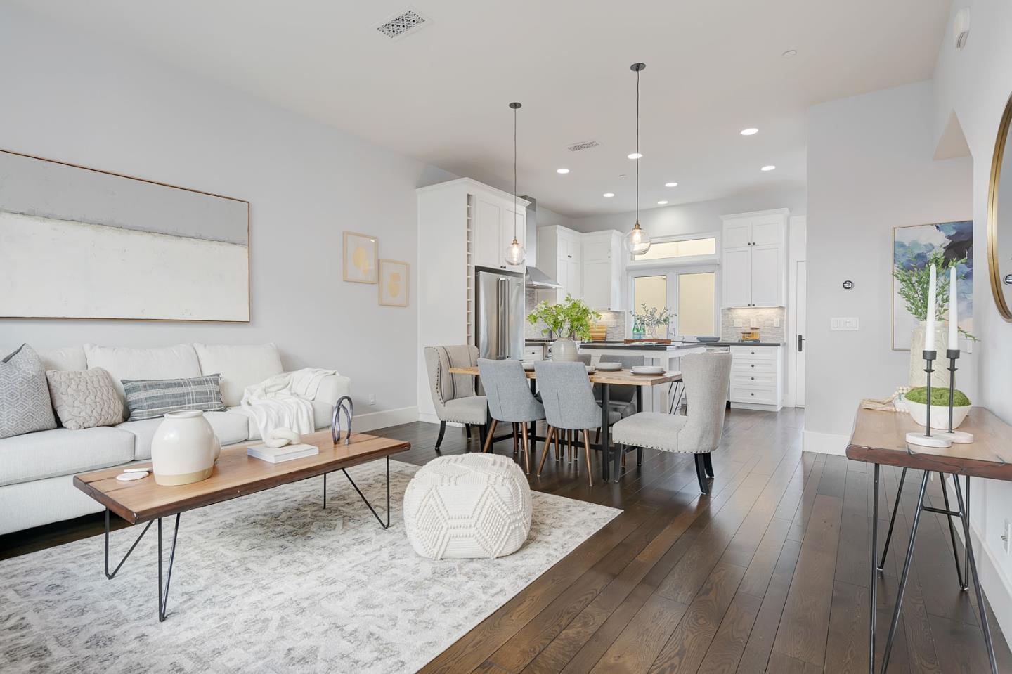 534 Fierro Loop Campbell, CA 95008 - Photo 13 of 55 a living room with kitchen island furniture and a wooden floor
