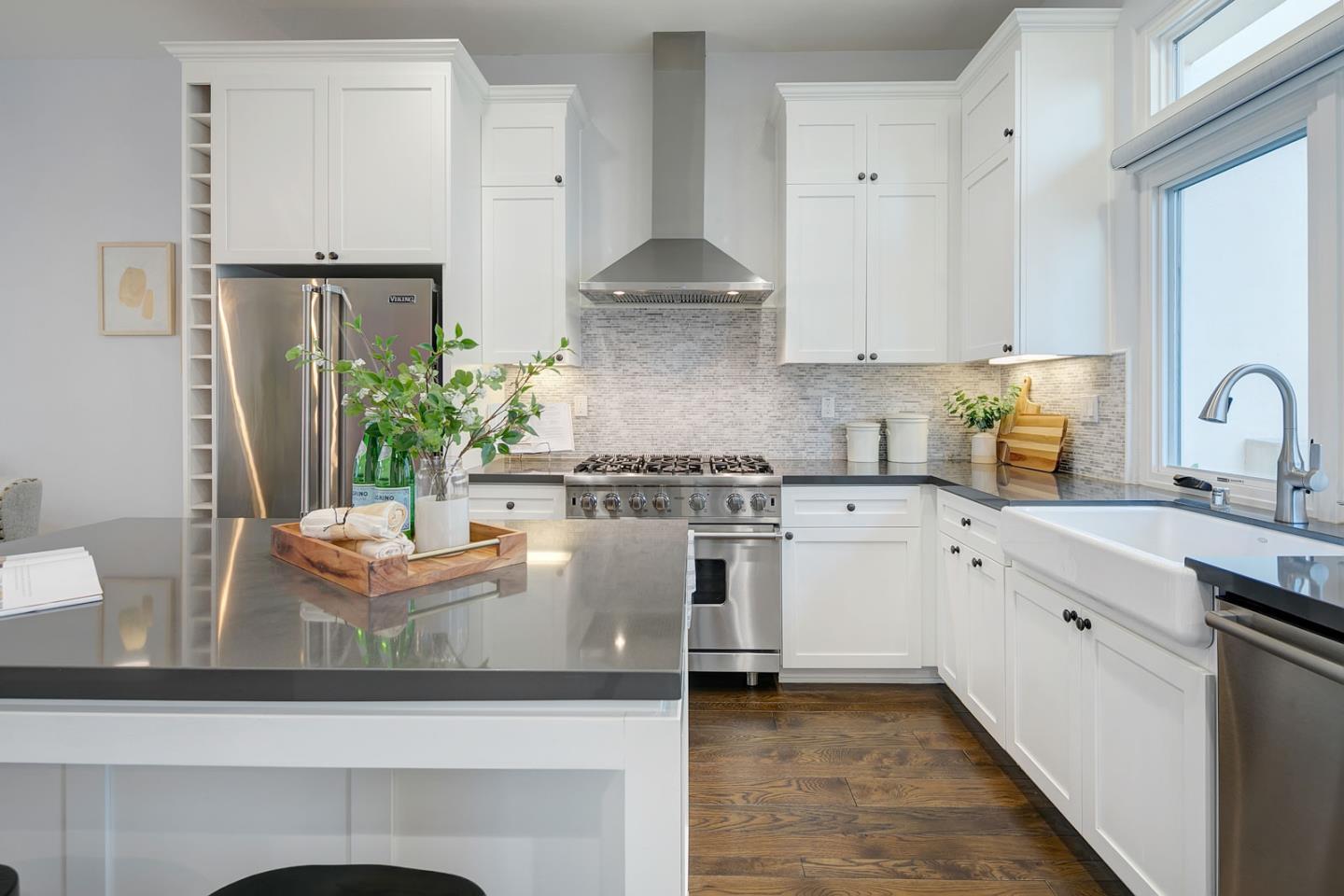 534 Fierro Loop Campbell, CA 95008 - Photo 18 of 55 a kitchen with stainless steel appliances granite countertop a stove a sink and a refrigerator