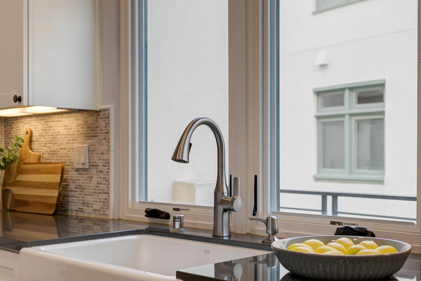 534 Fierro Loop Campbell, CA 95008 - Photo 21 of 55 a bathroom with a sink a bathtub and a window