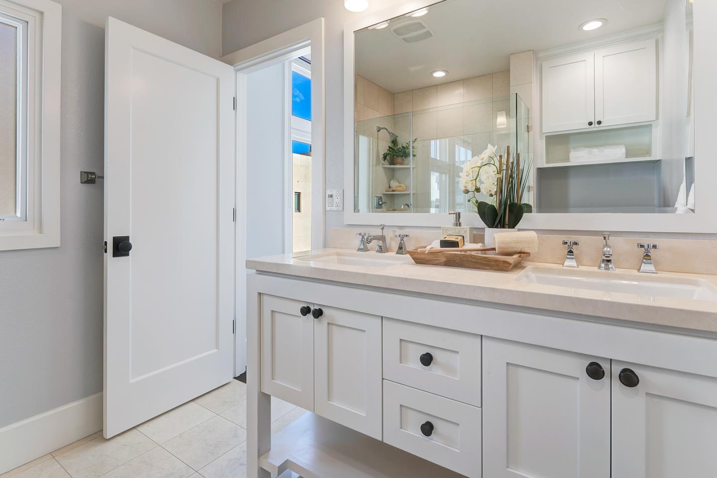 534 Fierro Loop Campbell, CA 95008 - Photo 30 of 55 a bathroom with a granite countertop sink mirror and double