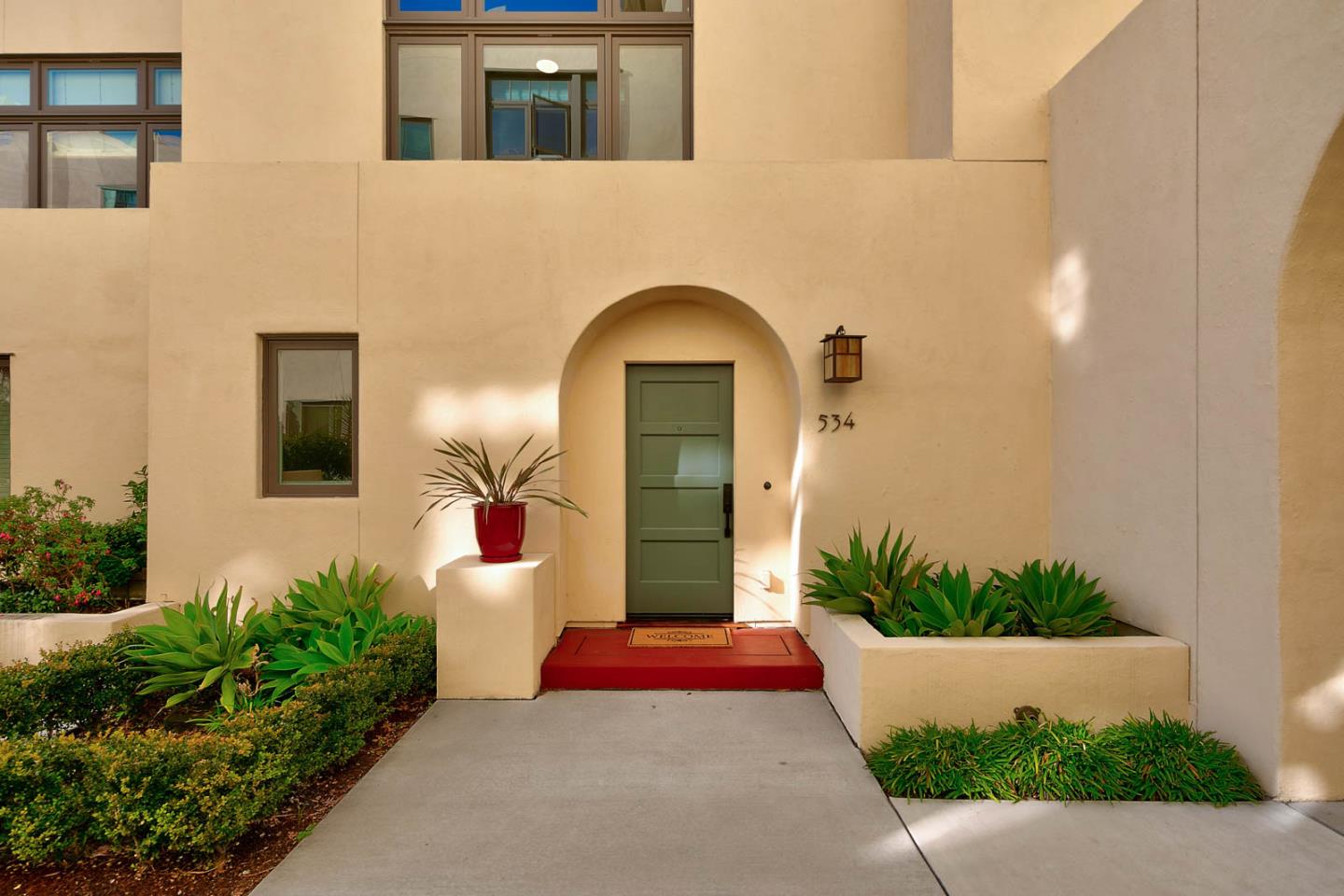 534 Fierro Loop Campbell, CA 95008 - Photo 4 of 55 a front view of a house with a garden