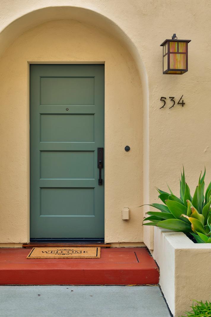 534 Fierro Loop Campbell, CA 95008 - Photo 5 of 55 a front view of a house with a garage
