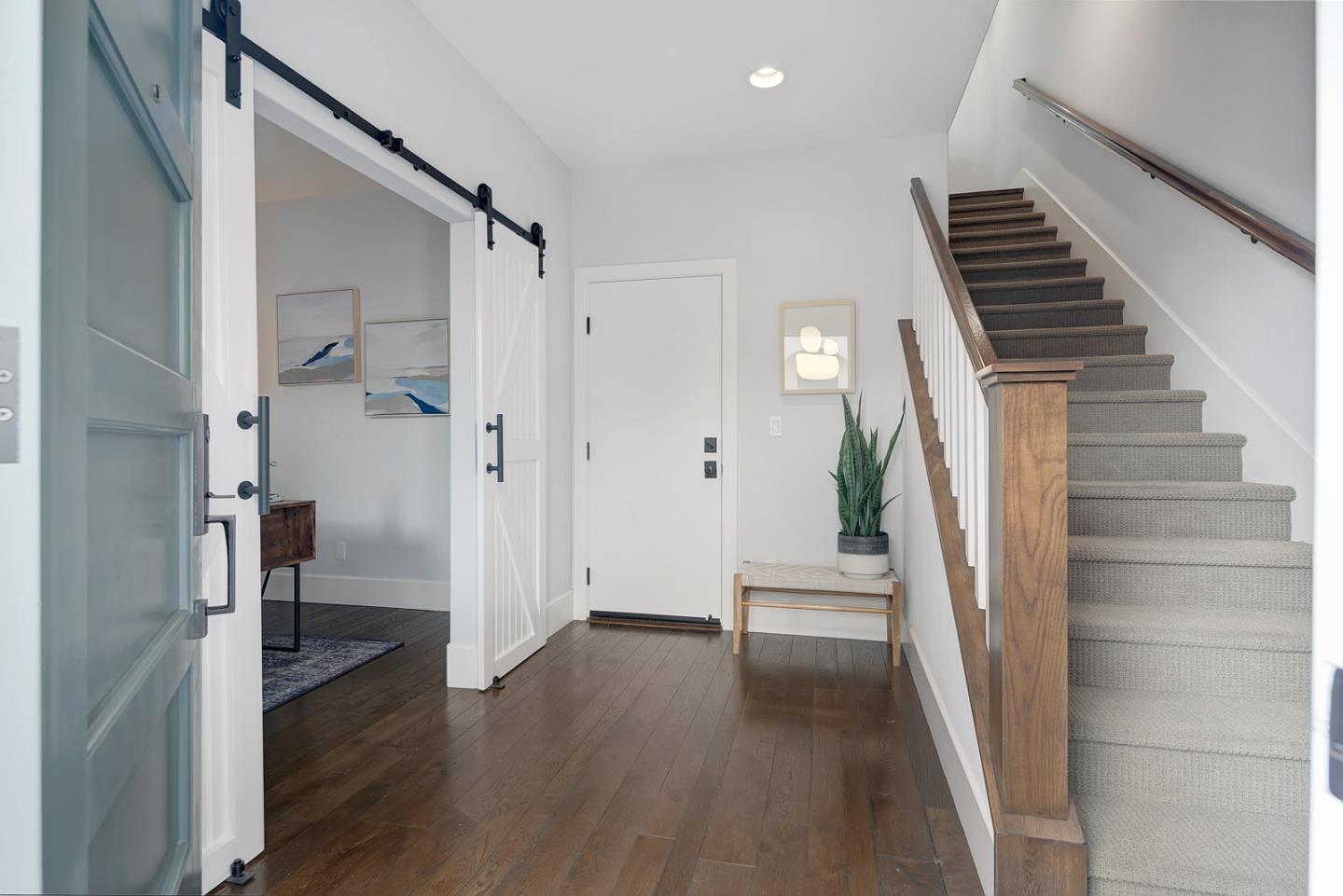 534 Fierro Loop Campbell, CA 95008 - Photo 7 of 55 a view of a hallway view with wooden floor and staircase