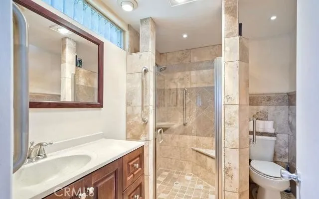 a bathroom with a shower and a bath tub