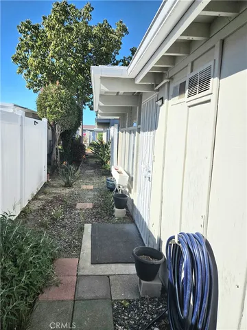 a view of a balcony with a potted plant