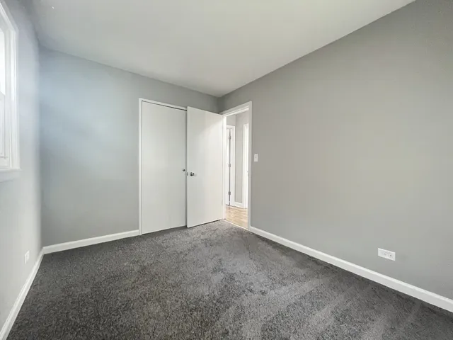 a kitchen with a sink and washing machine