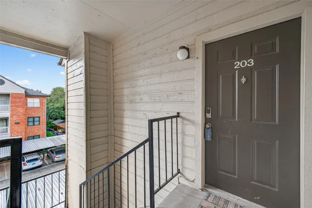 a view of an entryway with a door