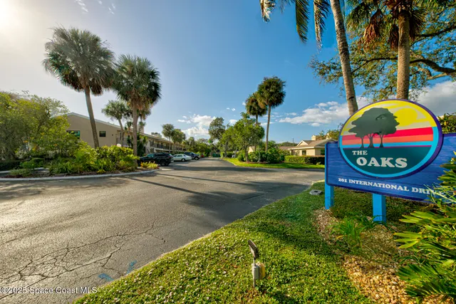 a view of a swimming pool with an outdoor seating
