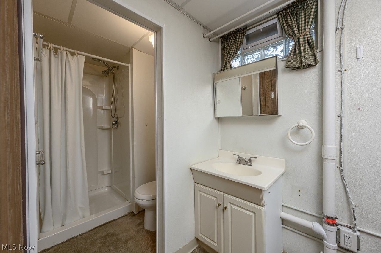 1422 Monument Road Northwest Canton, OH 44703 - Photo 21 of 31 Lower level full bathroom