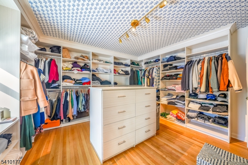 250 Old Short Hills Road Short Hills, NJ 07078 - Photo 18 of 38 a view of walk in closet with clothes and shoes