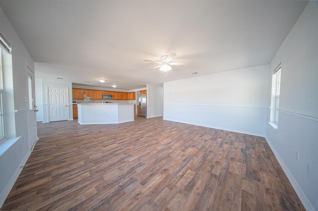 121 Washburn Road North Bells, TX 75414 - Photo 11 of 40 a view of empty room with wooden floor