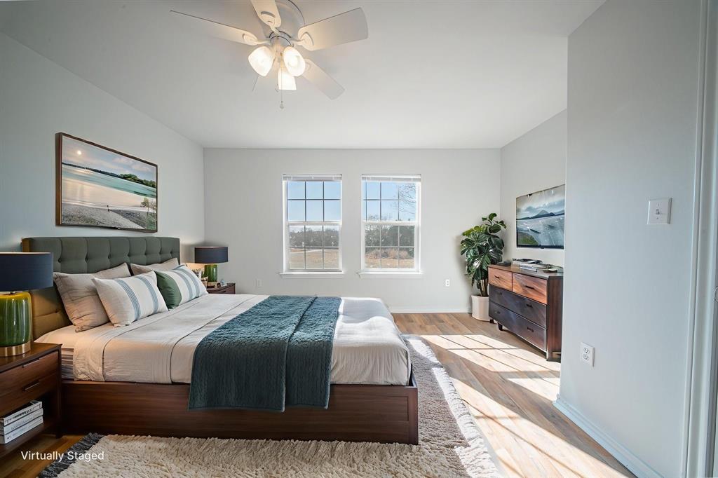 121 Washburn Road North Bells, TX 75414 - Photo 13 of 40 a bedroom with a large bed and a window