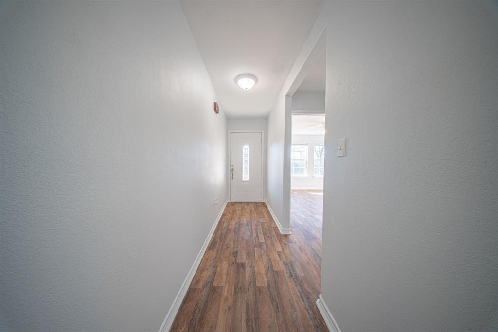 121 Washburn Road North Bells, TX 75414 - Photo 34 of 40 a view of entryway with wooden floor