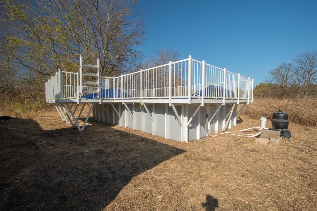 121 Washburn Road North Bells, TX 75414 - Photo 37 of 40 a view of a backyard with sitting area