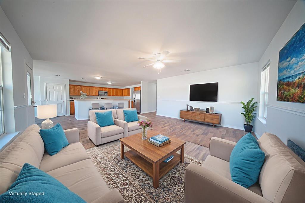 121 Washburn Road North Bells, TX 75414 - Photo 10 of 40 a living room with furniture and a flat screen tv
