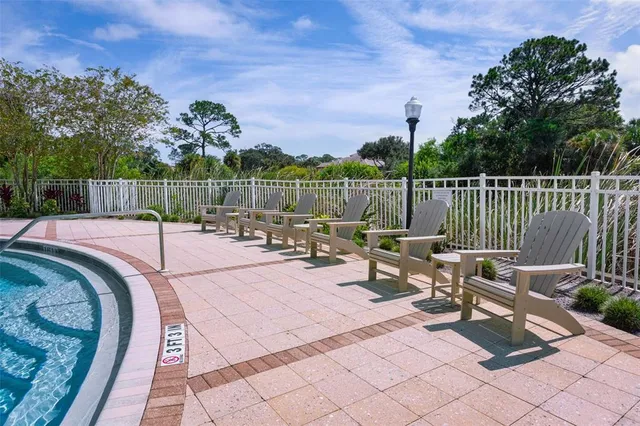 a room with furniture and pool table