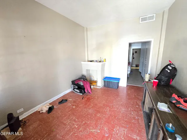 a room with furniture and a wooden floor