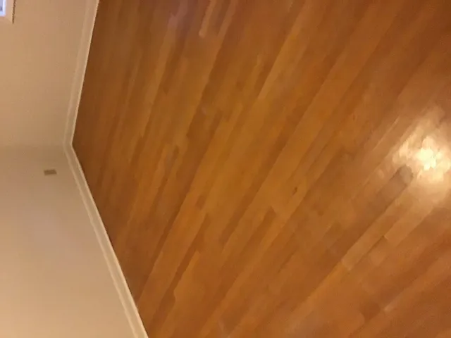 a bathroom with a sink mirror and toilet