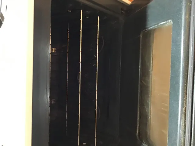 a bathroom with a mirror and a shower