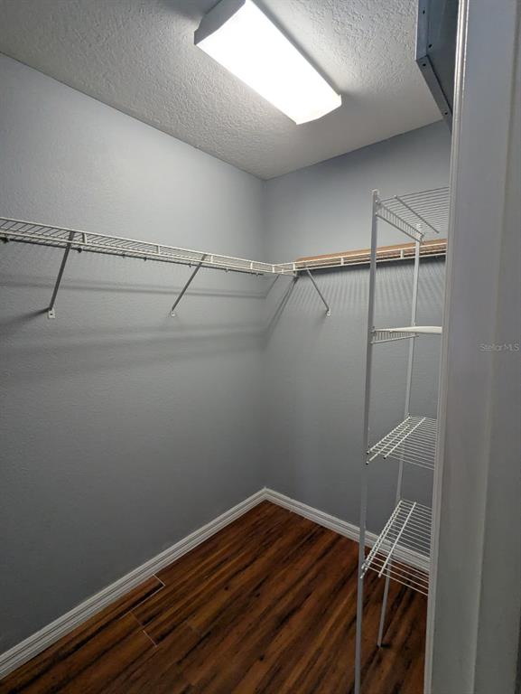 1538 Algonkin Loop Orlando, FL 32828 - Photo 15 of 48 a view of small space with racks on the wall