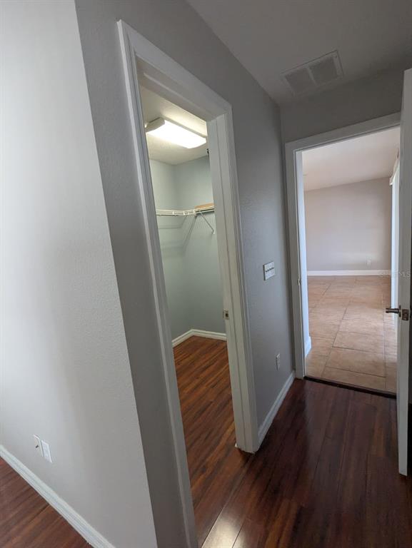 1538 Algonkin Loop Orlando, FL 32828 - Photo 16 of 48 wooden floor in a gallery