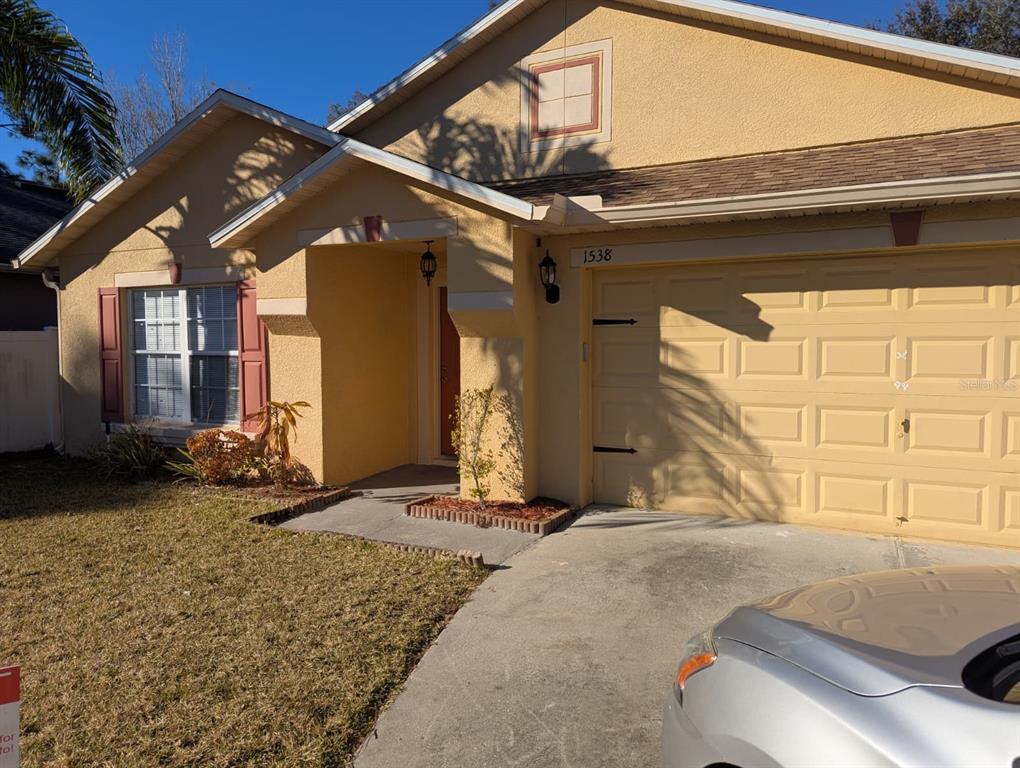 1538 Algonkin Loop Orlando, FL 32828 - Photo 2 of 48 a front view of a house