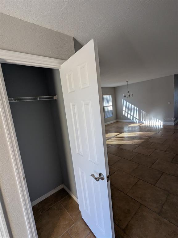 1538 Algonkin Loop Orlando, FL 32828 - Photo 45 of 48 a view of staircase with wooden floor