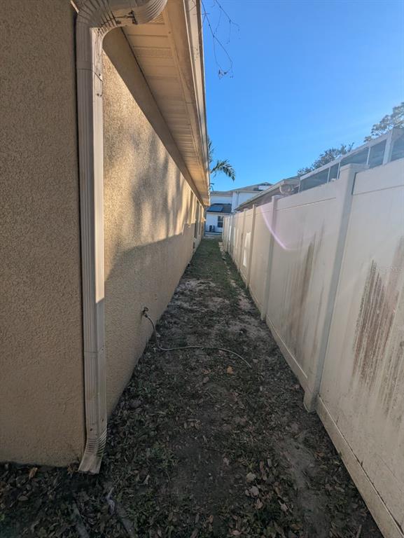 1538 Algonkin Loop Orlando, FL 32828 - Photo 7 of 48 a view of a pathway of a house with a stairs
