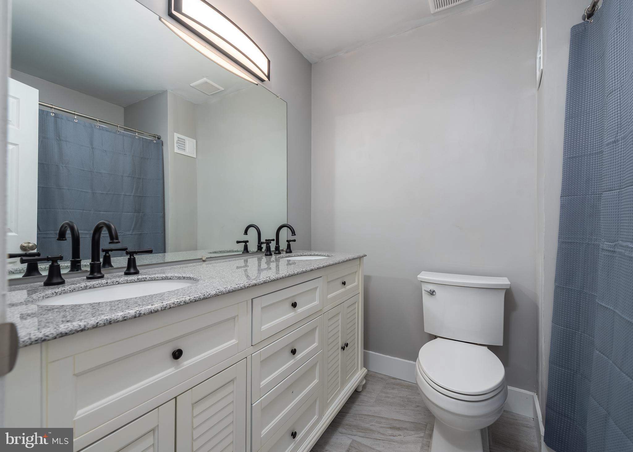 9423 Nicklaus Lane, Unit 59 Laurel, MD 20708 - Photo 14 of 21 Primary bathroom
