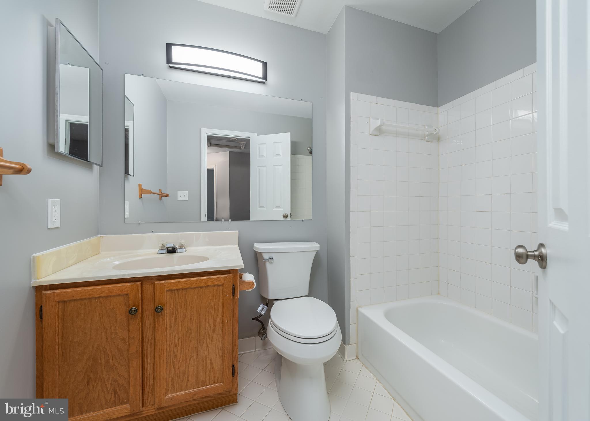 9423 Nicklaus Lane, Unit 59 Laurel, MD 20708 - Photo 17 of 21 Upstairs hall bath