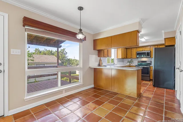 a view of a kitchen with a sink