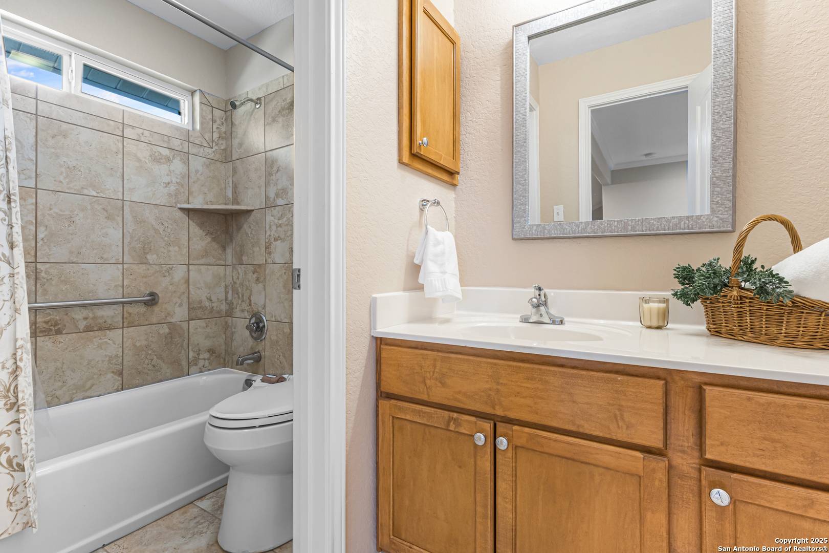 890 Live Oak Drive Spring Branch, TX 78070 - Photo 21 of 49 a bathroom with a granite countertop sink toilet and shower