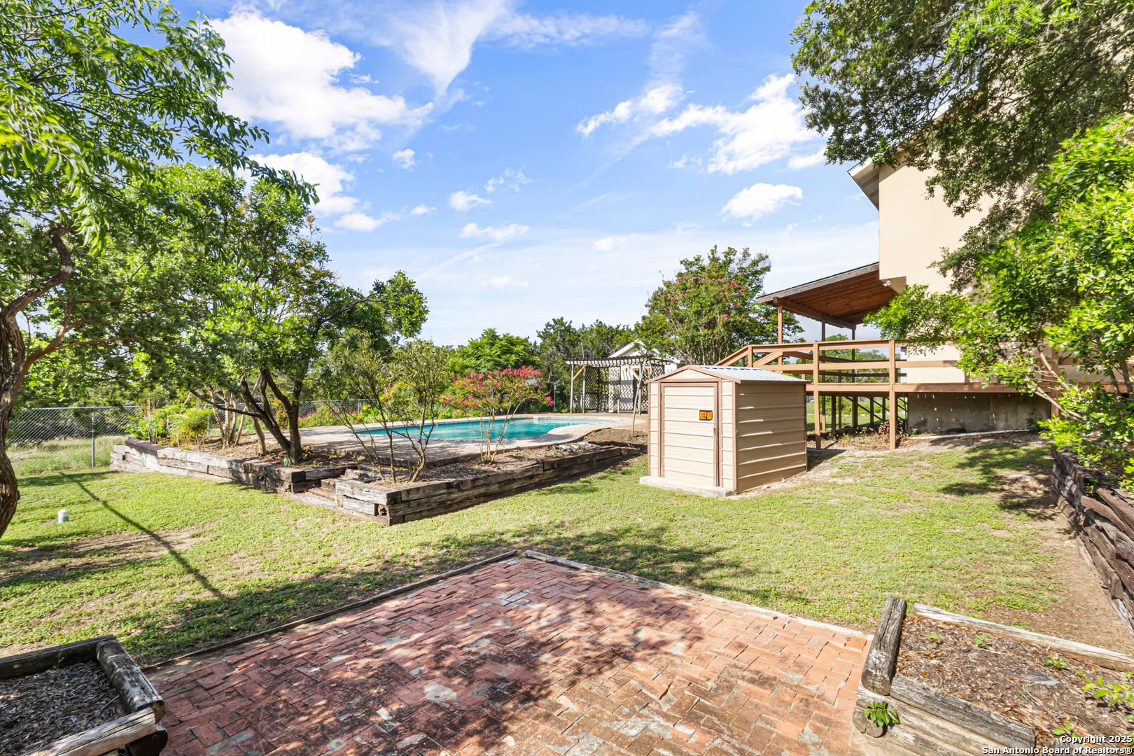 890 Live Oak Drive Spring Branch, TX 78070 - Photo 30 of 49 a view of a house with yard and sitting area