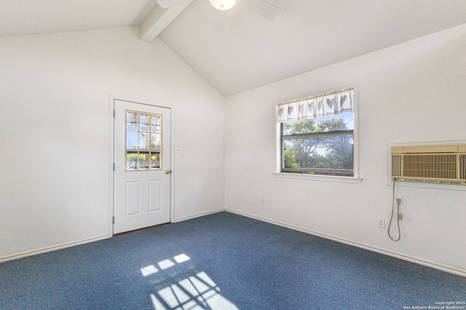 890 Live Oak Drive Spring Branch, TX 78070 - Photo 33 of 49 an empty room with windows