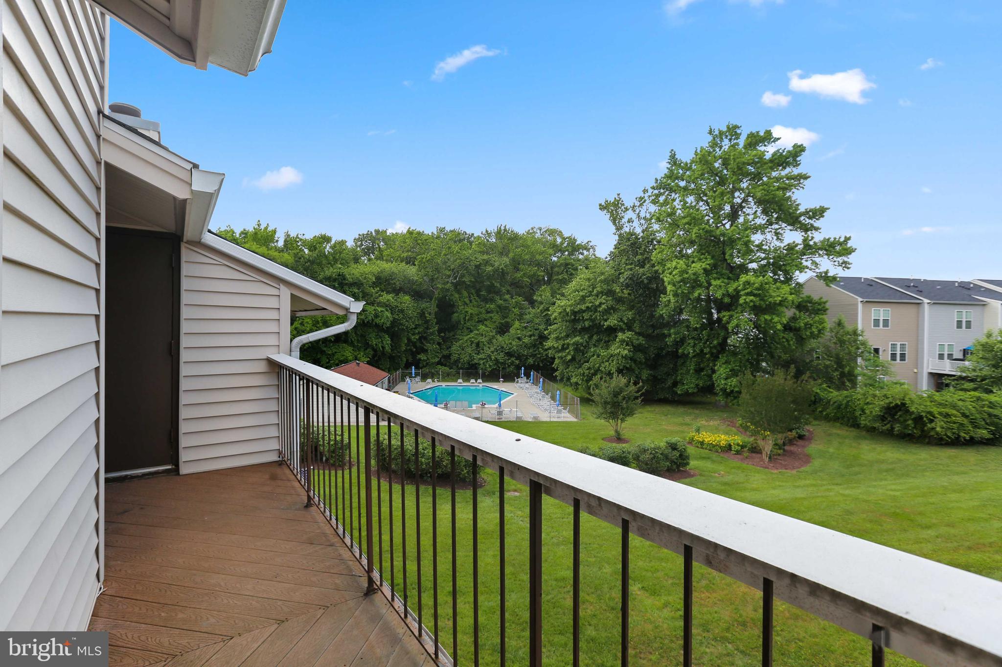 1110 Castle Harbor Way, Unit 3D Glen Burnie, MD 21060 - Photo 26 of 30 a view of a balcony with an outdoor space