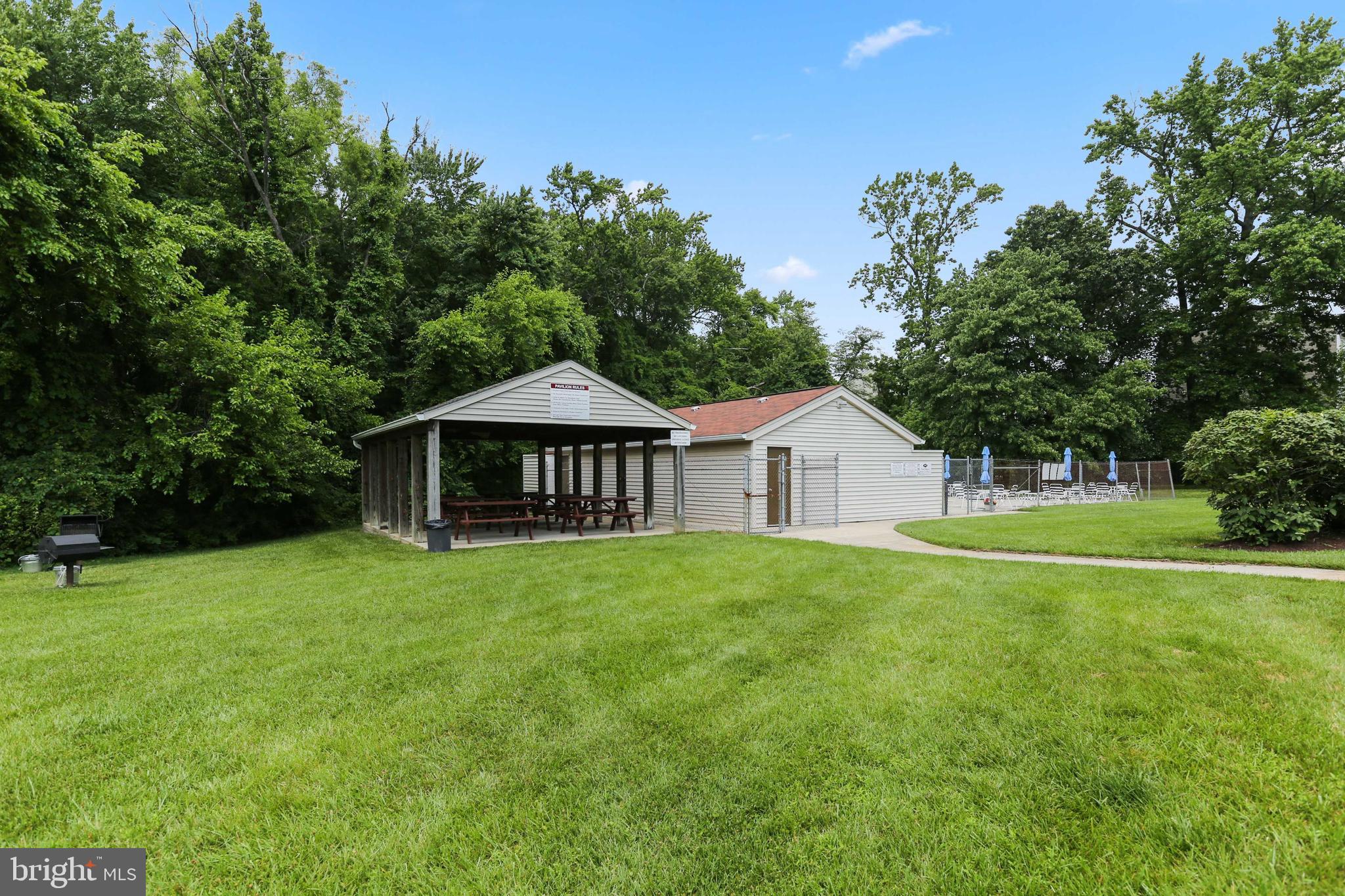 1110 Castle Harbor Way, Unit 3D Glen Burnie, MD 21060 - Photo 29 of 30 a view of a house with a backyard
