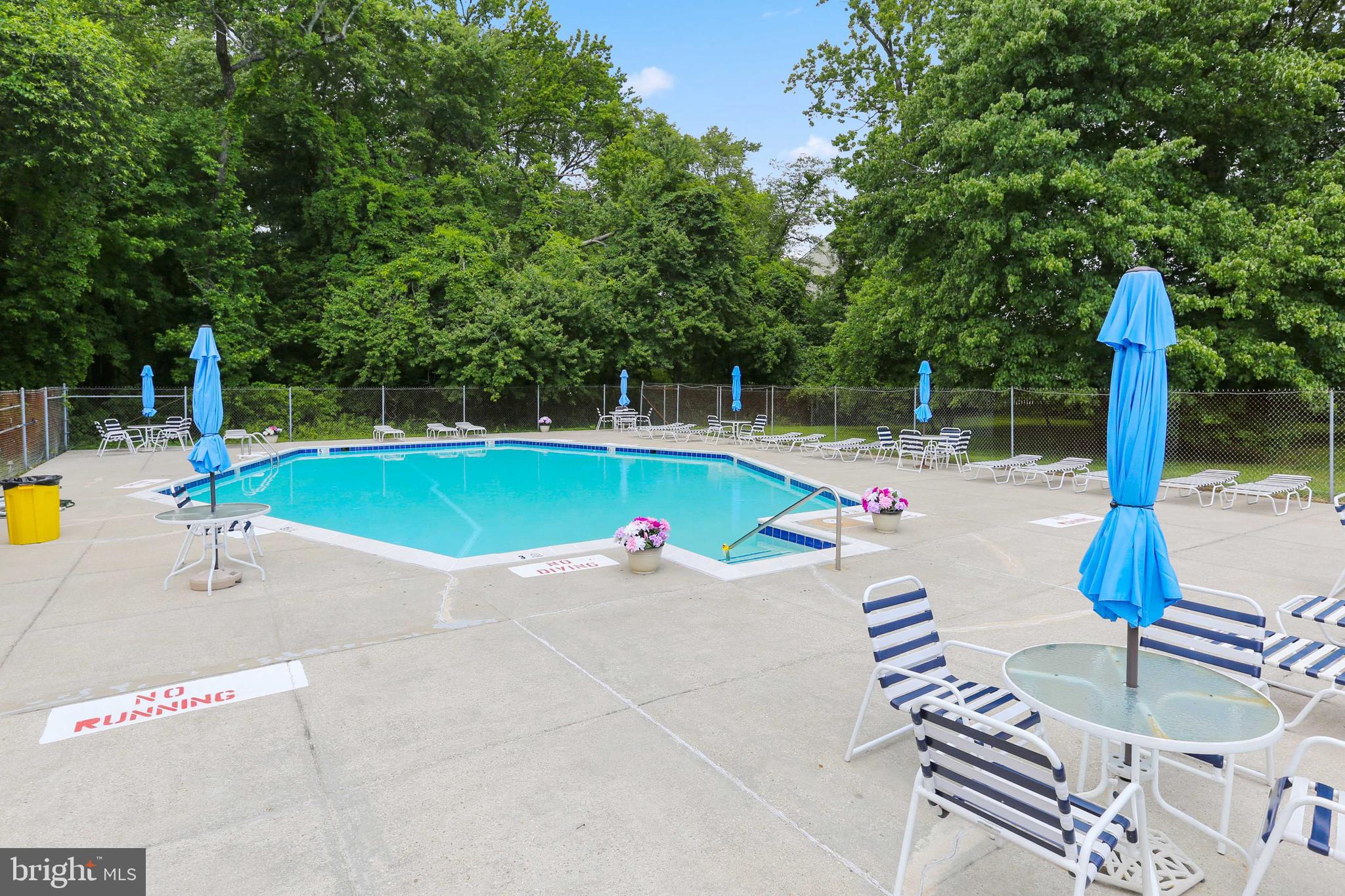 1110 Castle Harbor Way, Unit 3D Glen Burnie, MD 21060 - Photo 30 of 30 a view of a swimming pool with a patio