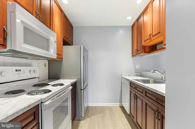 a kitchen with a stove and a microwave