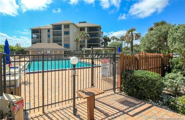 a front view of a house with a patio