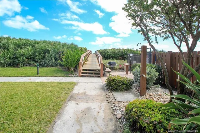 a view of a garden with a slide